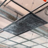 Dalle de plafond électrique efficace pour répondre au décret tertiaire, France 2030. Aquilohm fabricant français de chauffage à infrarouge lointain. Économie d'énergie, infrarouge lointain, confort utilisateur. Hôtellerie, restaurant, bureaux.